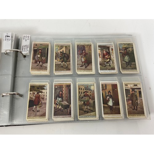 121 - A CIGARETTE CARD ALBUM CONTAINING 25 SETS OF ORIGINAL CARDS, MOSTLY G/VG, CATALOGUE £510+