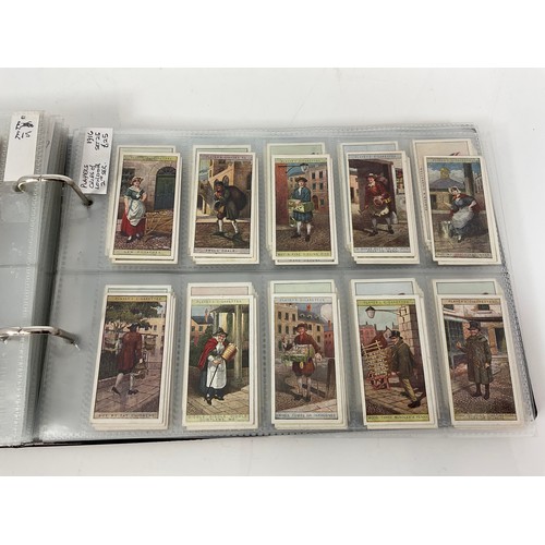 121 - A CIGARETTE CARD ALBUM CONTAINING 25 SETS OF ORIGINAL CARDS, MOSTLY G/VG, CATALOGUE £510+