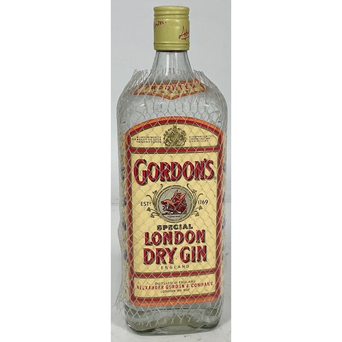 24 - ONE LITRE BOTTLE OF GORDONS LONDON DRY GIN TOGETHER WITH A 500ML BOTTLE OF URSUS VODKA AND A ONE LIT... 