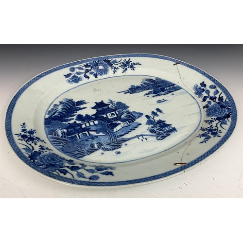 205 - LARGE ORIENTAL BLUE AND WHITE MEAT PLATE/ CHARGER, APPROX. 47 X 39 cm AF