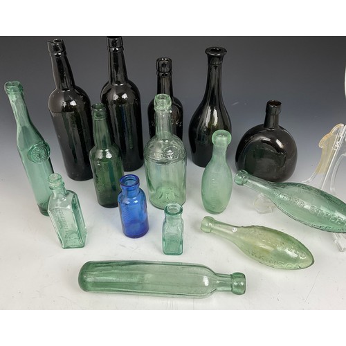 242 - COLLECTION OF OLD BROWN AND CLEAR GLASS BOTTLES