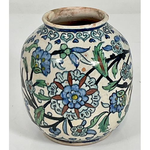 76 - POTTERY VASE WITH BLUE AND GREEN BRANCH AND FOLIAGE DECORATION, IN THE IZNIC STYLE, APPROX. 17 cm