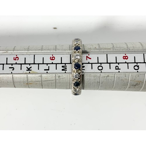 630 - DIAMOND AND SAPPHIRE ETERNITY RING