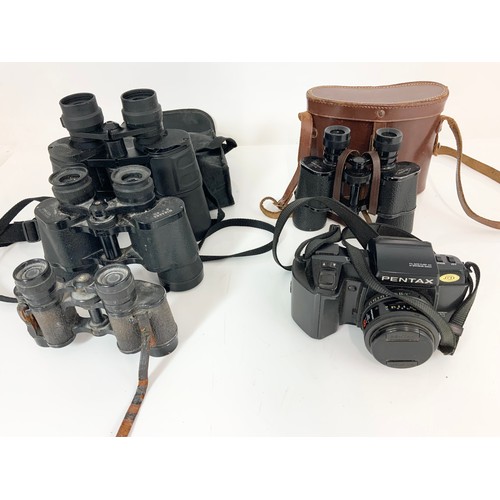 396 - PENTAX SLR CAMERA AND VARIOUS PAIRS OF BINOCULARS