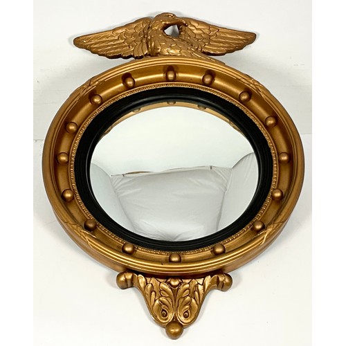 57 - CONVEX MIRROR WITH GILT WOOD SURROUND AND EAGLE SURMOUNT