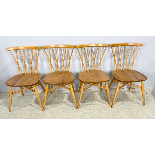 646 - SET OF FOUR ERCOL BLONDE STICK BACK DINING CHAIRS