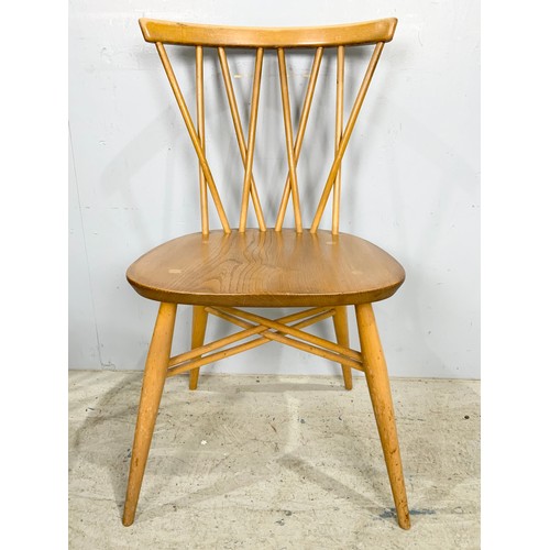 646 - SET OF FOUR ERCOL BLONDE STICK BACK DINING CHAIRS