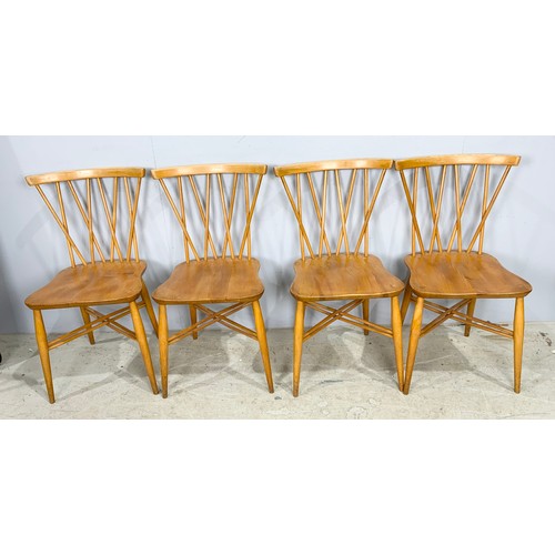 647 - SET OF FOUR ERCOL STICK BACK DINING CHAIRS