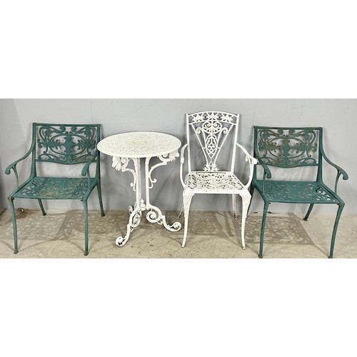 484 - PAIR OF CAST IRON GARDEN CHAIRS TOGETHER WITH ONE OTHER AND A TABLE