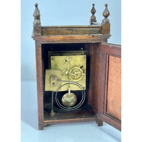 273 - OAK MANTLE CLOCK WITH SILVERED DIAL AND BRASS SPANDRELS