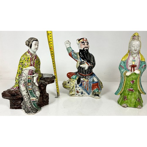 112 - THREE 19TH CENTURY ORIENTAL FIGURES ALL APPROX. 10 INCHES HIGH, WARRIOR AND TWO FEMALE FIGURES