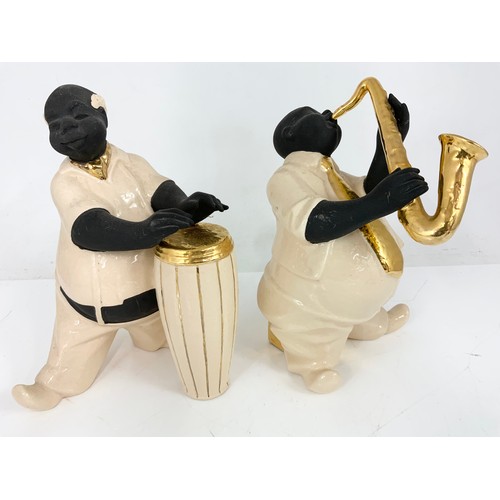 119 - TWO CERAMIC JAZZ PLAYERS MODELS WITH A UNUSUAL WEST INDIAN WOOD & WIRE MUSICIAN TALLEST  34cm