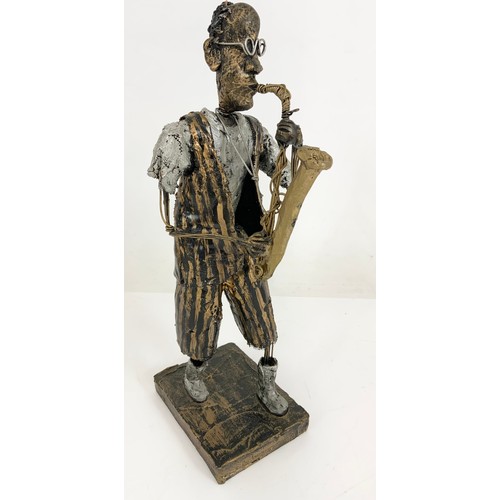 119 - TWO CERAMIC JAZZ PLAYERS MODELS WITH A UNUSUAL WEST INDIAN WOOD & WIRE MUSICIAN TALLEST  34cm