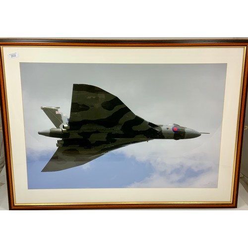 202 - FRAMED PHOTOGRAPH OF AVRO VULCAN XH558, APPROX 90 X 66 CM, IN THE BOTTOM RHS, THROCKMORTON 2015