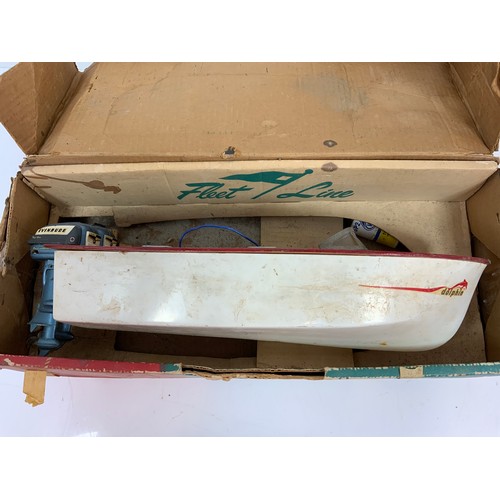 70 - BOXED FLEET LINE BOAT THE DOLPHIN SPEED BOAT TWIN MOTOR, T/W A SMALLER FLEET LINE BOAT, IN NEED OF S... 