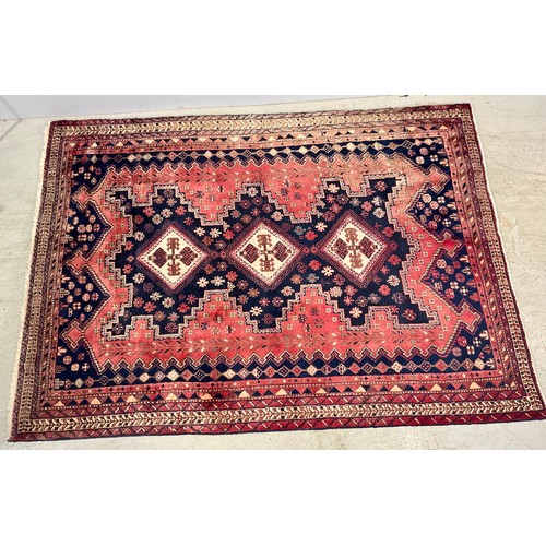 717 - PERSIAN RED GROUND CARPET, approx. 245 x 175 cm