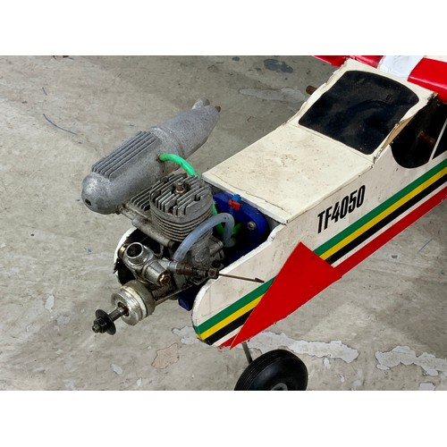 22 - RADIO CONTROLLED MODEL AIRCRAFT WITH ENGINE, A BOOMERANG TF4050