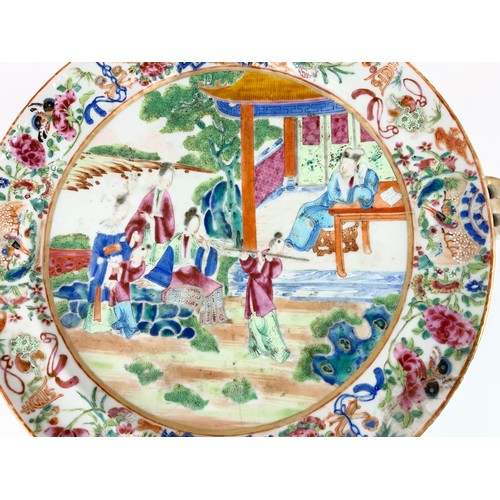 213 - UNUSUAL ORIENTAL  WARMING PLATE DECORATED WITH A COURT YARD SCENE