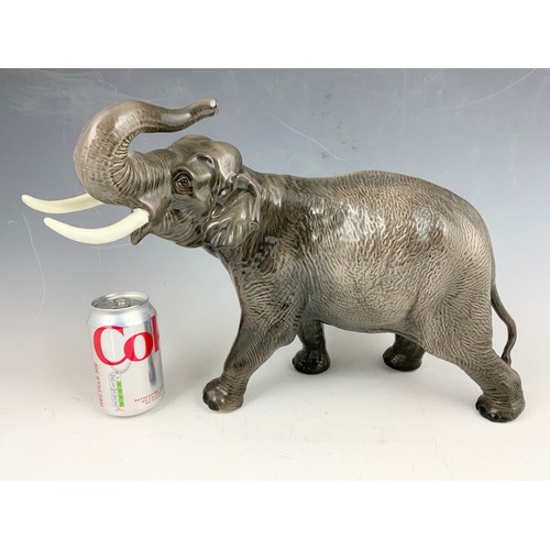 131 - LARGE BESWICK ELEPHANT WITH TRUNK IN SALUTE MODEL 1770 30cm TALL