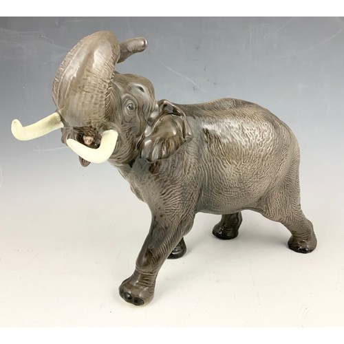 131 - LARGE BESWICK ELEPHANT WITH TRUNK IN SALUTE MODEL 1770 30cm TALL