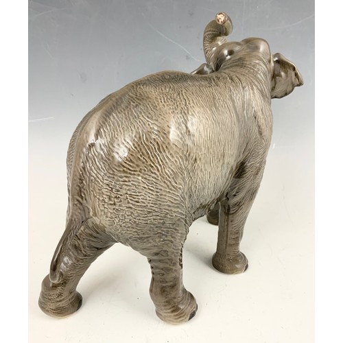 131 - LARGE BESWICK ELEPHANT WITH TRUNK IN SALUTE MODEL 1770 30cm TALL