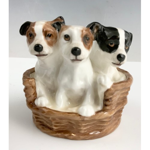 132 - ROYAL DOULTON FIGURE THE POTTER  HN1493 TOGETHER WITH ROYAL DOULTON DOGS IN A BASKET HN 2588