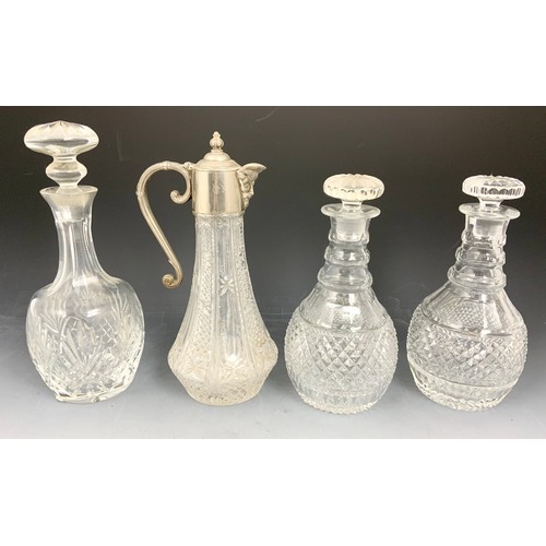 244 - PAIR OF CUT GLASS DECANTERS ONE OTHER  AND A CLARET JUG