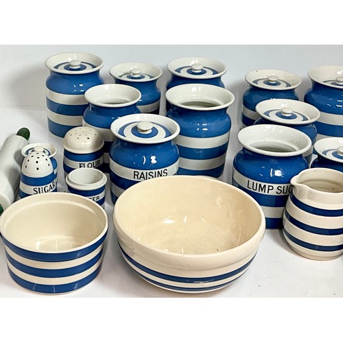 223 - LARGE QUANTITY OF CORNISH WARE STORAGE JARS, MIXING BOWLS, SPICE JARS, ROLLING PIN AND OTHERS