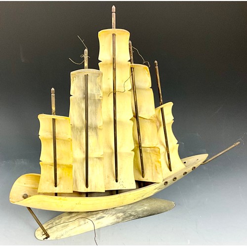 362 - 2 MODEL SAILING SHIPS MADE FROM HORN AND 1 GLASS SHIP IN A GLASS BOTTLE