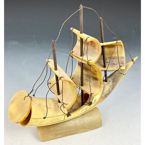 362 - 2 MODEL SAILING SHIPS MADE FROM HORN AND 1 GLASS SHIP IN A GLASS BOTTLE