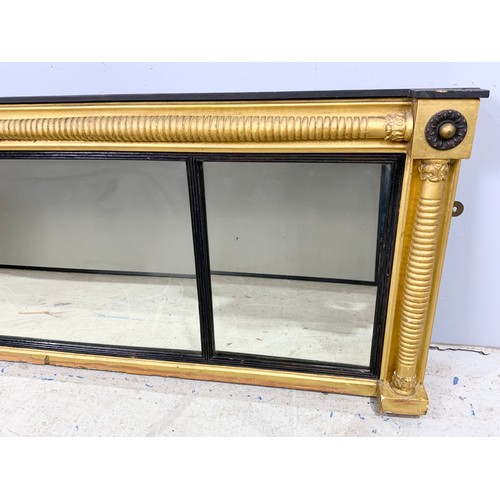 81 - LONG RECTANGULAR 3 PLATE MIRROR WITH ORNATE GILT SURROUND IN THE REGENCY STYLE ( FRAME 159cm x 54cm ... 