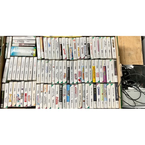 34 - NINTENDO DS CONSOLE AND LARGE QUANTITY OF GAMES