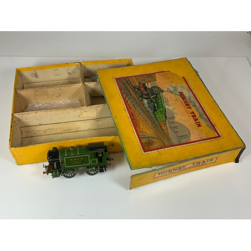 443 - HORNBY 0 GAUGE, A YELLOW BOXED HORNBY TRAIN NO 1 TANK GOODS SET TS409. CONTENTS ONLY ARE A LNER 0-4-... 