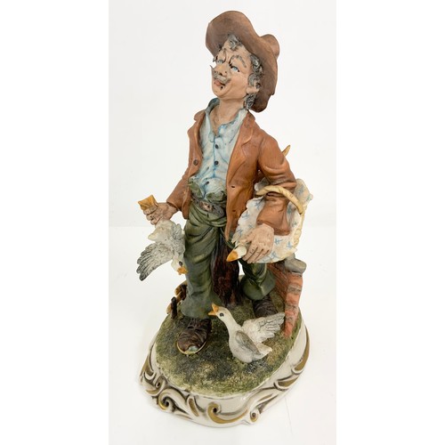 135 - 2 CAPODIMONTE FIGURINES  THE STAMP COLLECTOR AND A MAN WITH 3 GEESE / DUCKS TALLEST  26cm