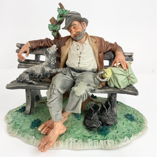 96 - 2 LARGE CAPODIMONTE FIGURINES  TRAMP ON BENCH &  MAN FRYING ON OPEN FIRE TALLEST 24cm