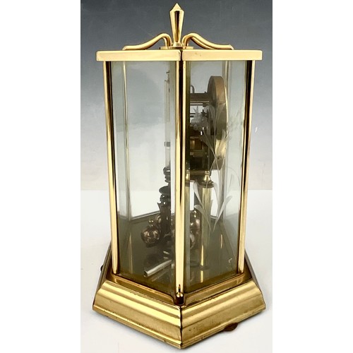 299 - VINTAGE ANNUAL BRASS & GLASS CASED TORSION CLOCK