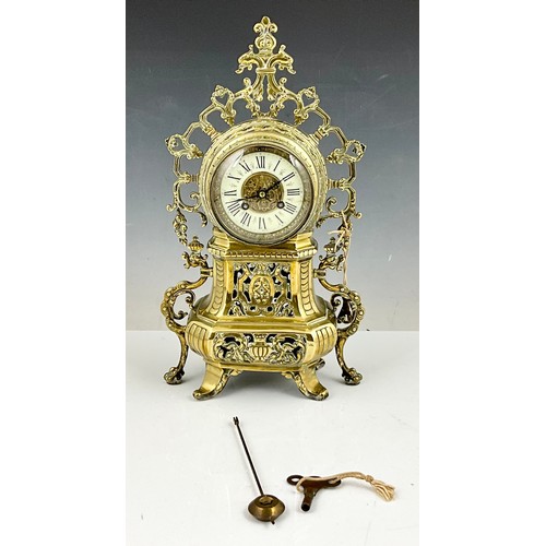 298 - 17” ANTIQUE POLISHED BRASS BAROQUE STYLE TABLETOP CLOCK (HAS NUMBER 9027 ENGRAVED INSIDE)