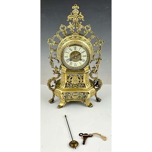 298 - 17” ANTIQUE POLISHED BRASS BAROQUE STYLE TABLETOP CLOCK (HAS NUMBER 9027 ENGRAVED INSIDE)