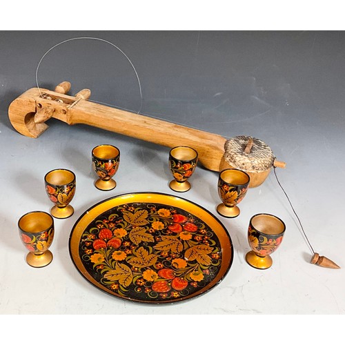 439 - RUSSIAN LACQUERED EGG CUP SET (AND INSTRUMENT)