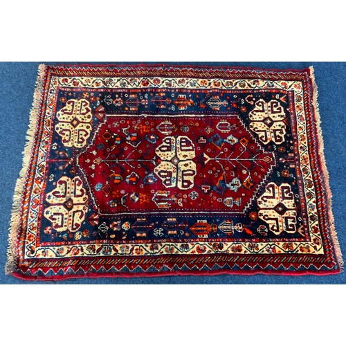 1061 - 2 GOOD QUALITY IRANIAN RED GROUND RUGS LARGEST 153cm x 115cm