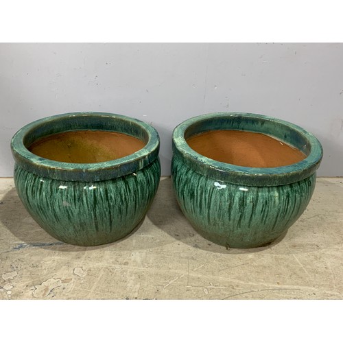 601 - TWO GREEN GLAZED LARGE GARDEN PLANTERS, APPROX 30 CM TALL, 45 CM WIDE