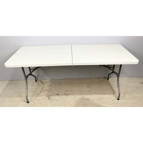 591 - FOLDING TRESTLE TABLE