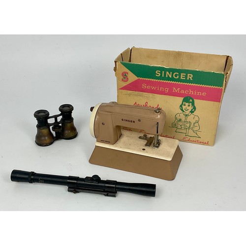 445 - PAIR OF BINOCULARS AND GUN SIGHT TOGETHER WITH A CHILD’S SEWING MACHINE