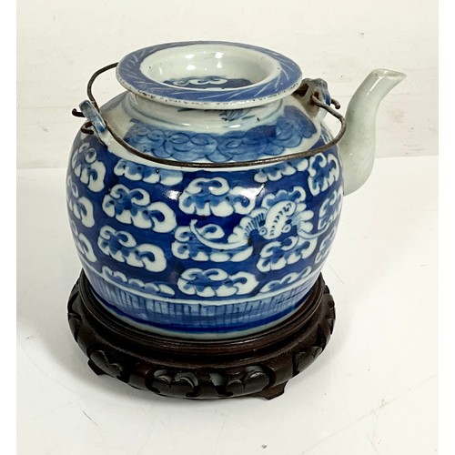 67 - ORIENTAL BLUE AND WHITE TEAPOT ON STAND