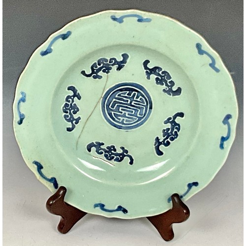 66 - BLUE AND WHITE CHARGER WITH FIRING CRACKS AND FOUR-CHARACTER SEAL MARK