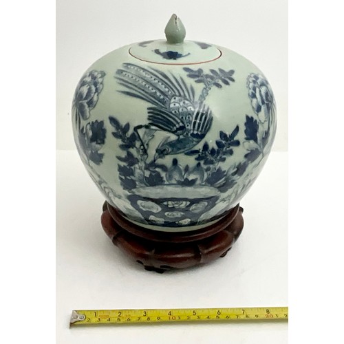 65 - BLUE AND WHITE BALUSTER JAR WITH COVER ON HARDWOOD STAND