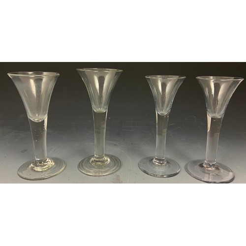 75 - 4 VARIOUS GEORGIAN DRAWN TRUMPET DRINKING GLASSES, TALLEST APPROX. 18 cm