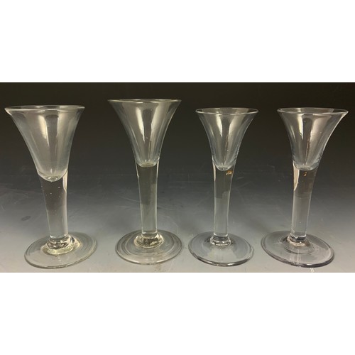 75 - 4 VARIOUS GEORGIAN DRAWN TRUMPET DRINKING GLASSES, TALLEST APPROX. 18 cm