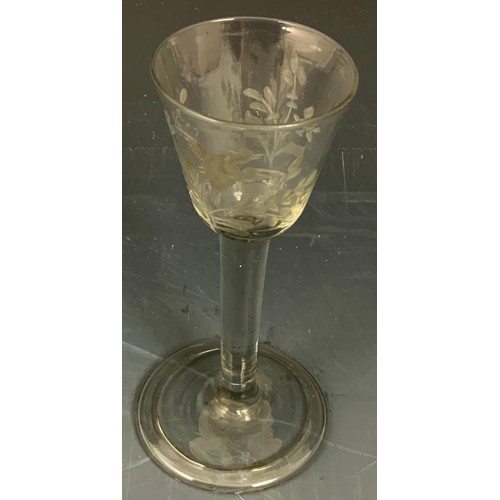 77 - 18TH CENTURY DRINKING GLASS HAVING OGEE SHAPED BOWL WITH GAME BIRD ENGRAVED DECORATION ON A PLAIN ST... 