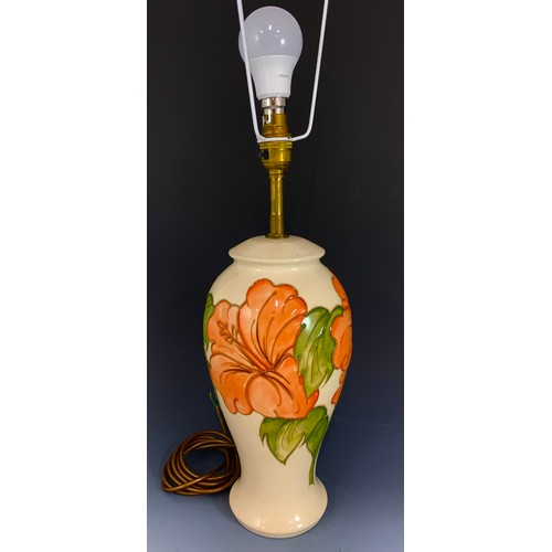 54 - LARGE MOORCROFT POTTERY TABLE LAMP HIBISCUS PATTERN ON CREAM GROUND